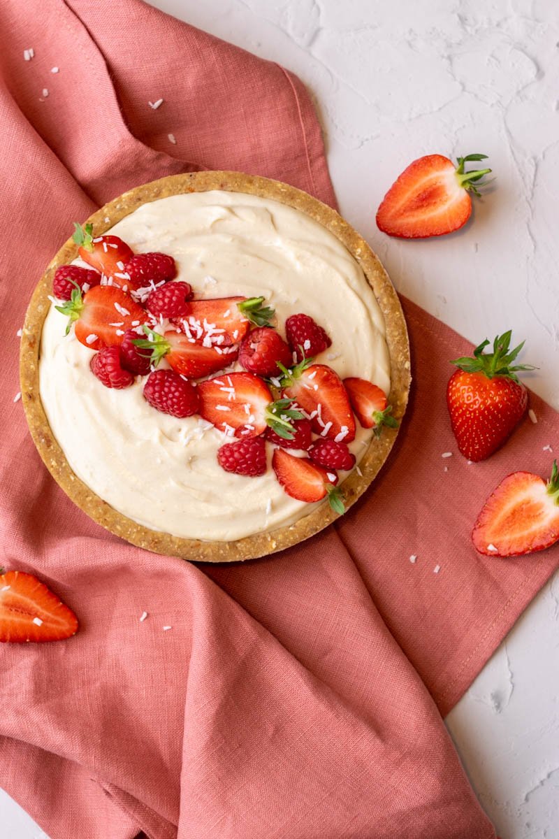 Finished tart with fruits and strawberries top view