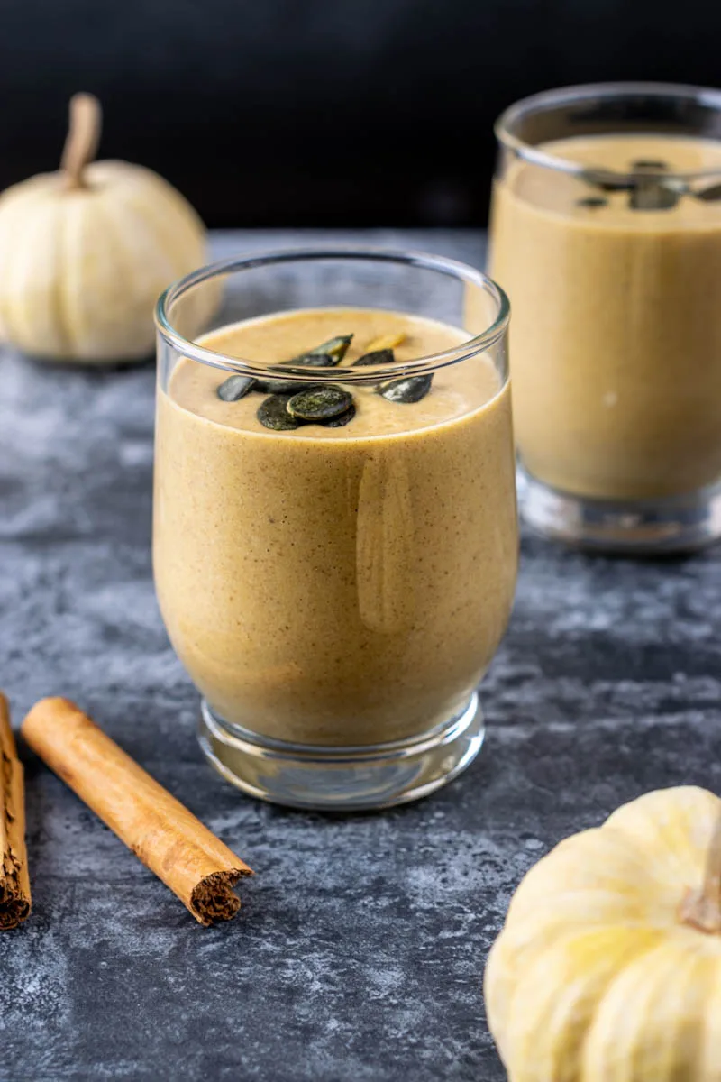 Glass of pumpkin smoothie close view