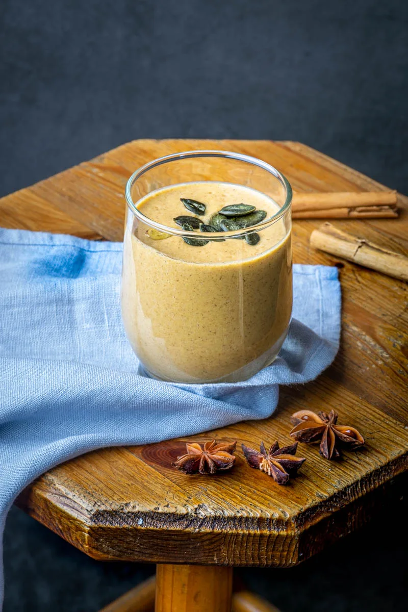 Glass of pumpkin smoothie close view